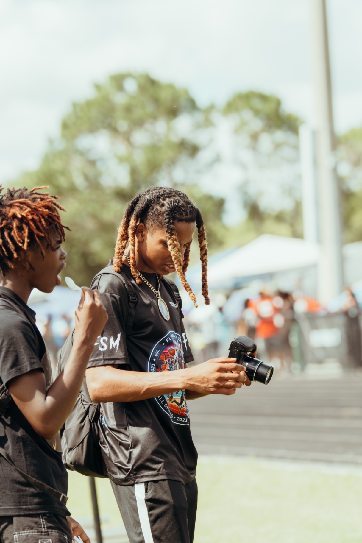 Red reviewing shots on his camera